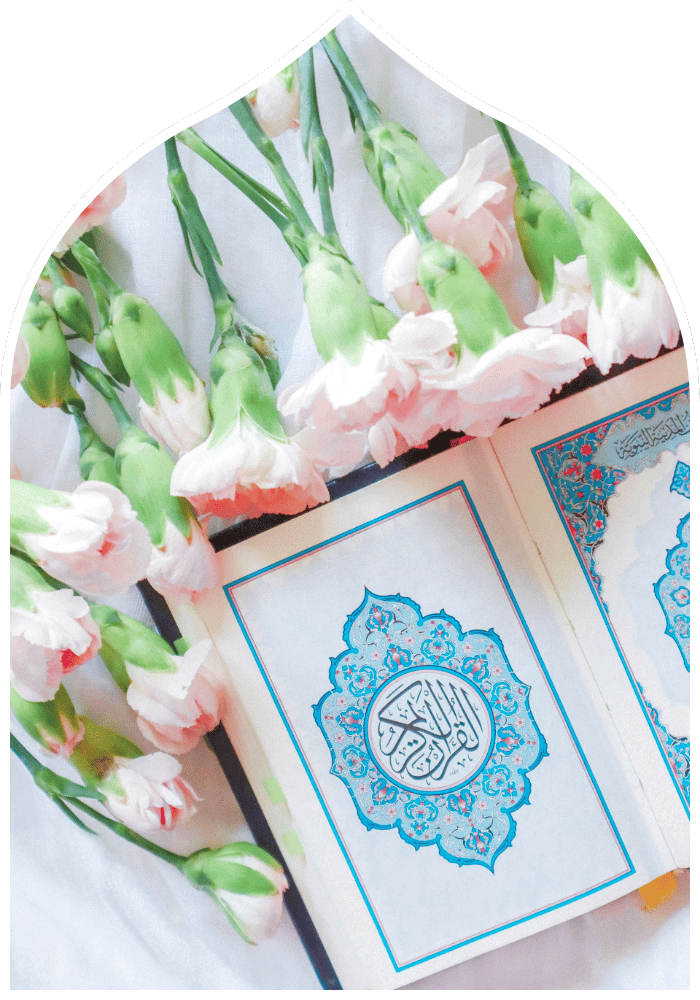 blue quran with flowers